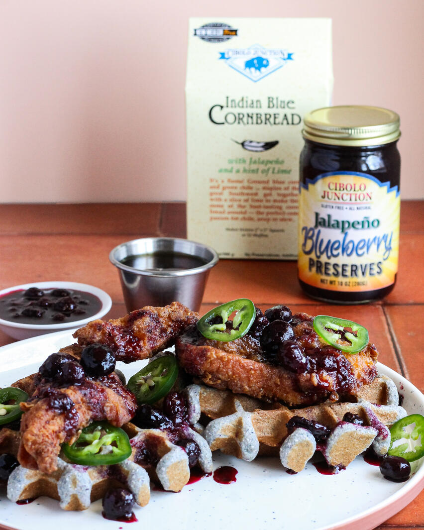 Chicken and waffles with branded blueberry chile jam.