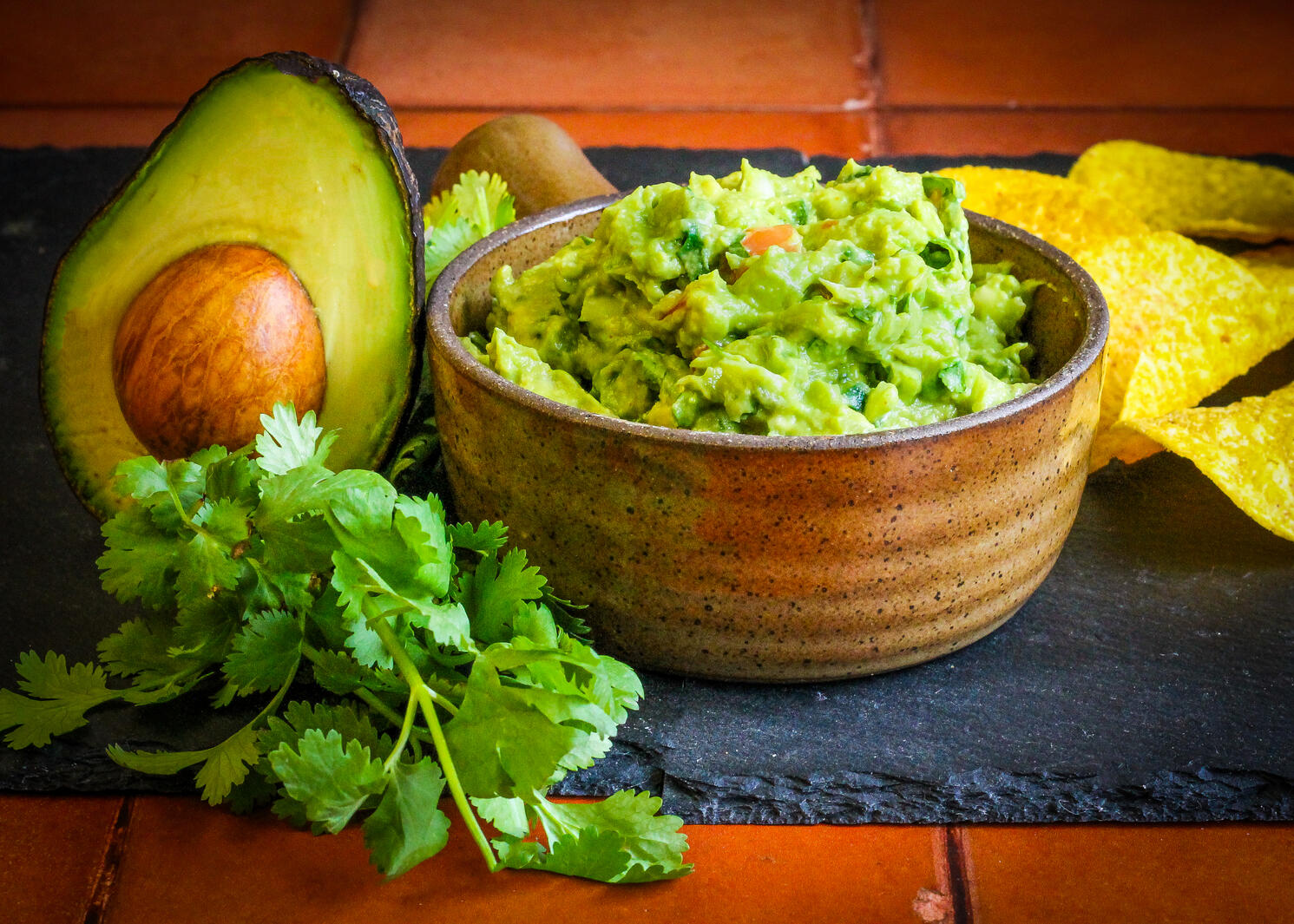 Guacamole and ingredients.